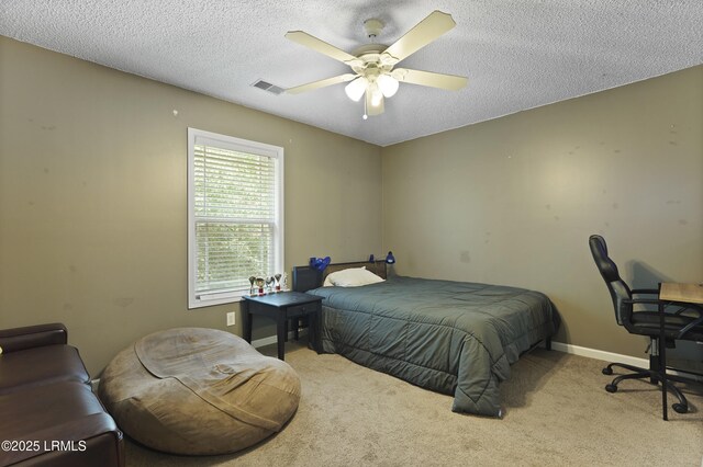 93 Heartstone Cir, Bluffton, SC 29910 - bedroom featuring a textured ceiling, carpet flooring, baseboards, and a ceiling fan