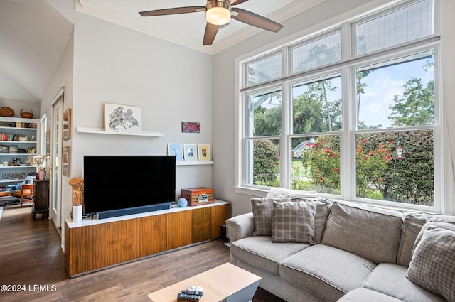 living room featuring hardwood / wood-style flooring, ceiling fan, crown molding, and built in features