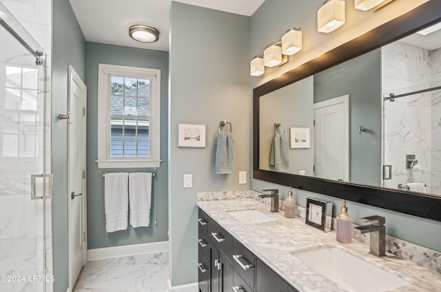 bathroom with vanity and a shower with shower door