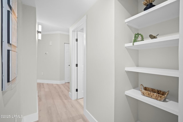 21 S Forest Beach Dr Unit 235, Hilton Head Island, SC 29928 - corridor featuring light wood-style flooring and baseboards