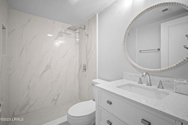 21 S Forest Beach Dr Unit 235, Hilton Head Island, SC 29928 - full bathroom with vanity, toilet, a marble finish shower, and visible vents