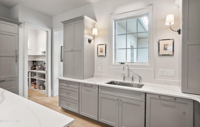 bathroom with vanity and hardwood / wood-style flooring