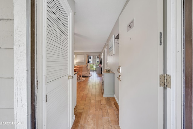 hall featuring light hardwood / wood-style flooring