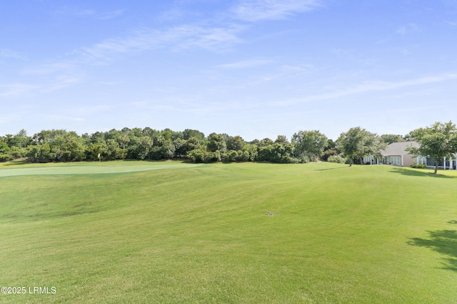 127 Kings Creek Dr, Bluffton, SC 29909 - view of community with view of golf course, a yard, and view of wooded area