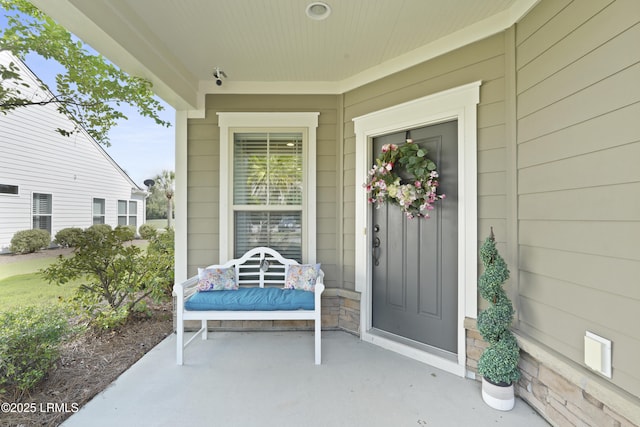 127 Kings Creek Dr, Bluffton, SC 29909 - entrance to property featuring covered porch and stone siding
