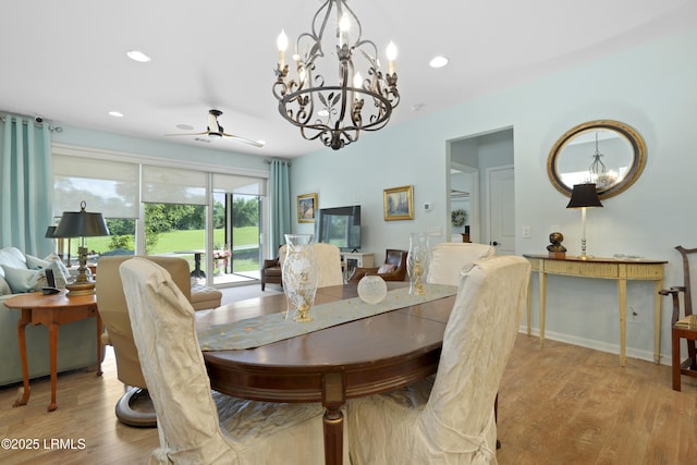 127 Kings Creek Dr, Bluffton, SC 29909 - dining room featuring a chandelier, ceiling fan, wood finished floors, and recessed lighting