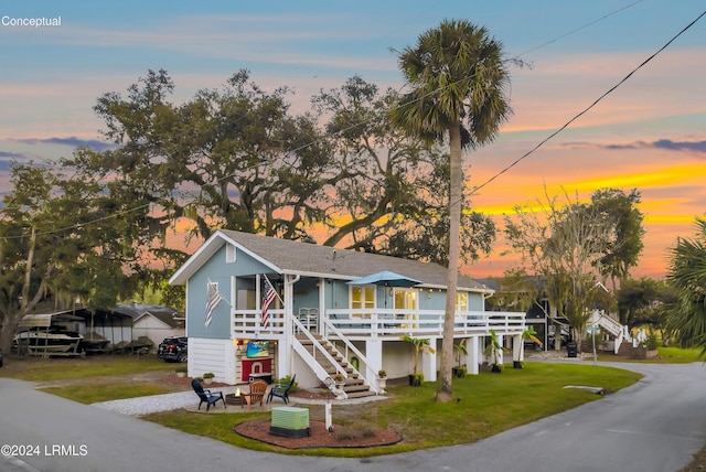 view of front of home with a yard