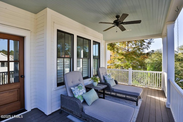 wooden deck with ceiling fan