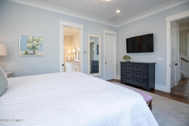 bedroom featuring connected bathroom, recessed lighting, wood finished floors, baseboards, and crown molding