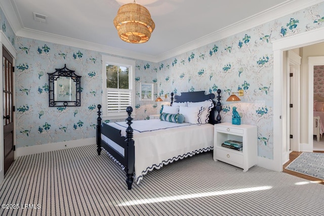 bedroom with ornamental molding, visible vents, baseboards, and wallpapered walls