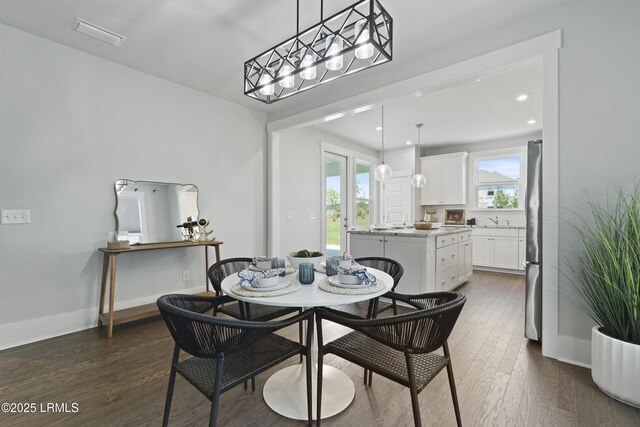 264 Aurora Way, Bluffton, SC 29909 - dining area featuring dark wood-style floors, baseboards, and recessed lighting