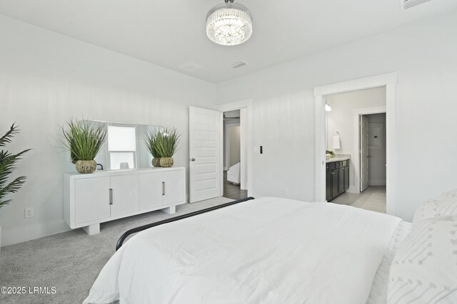 264 Aurora Way, Bluffton, SC 29909 - bedroom with a chandelier, ensuite bath, light colored carpet, and baseboards