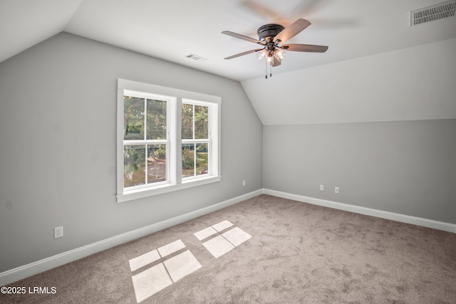 9 Attaway Ln, Beaufort, SC 29907 - additional living space with vaulted ceiling, ceiling fan, carpet floors, and baseboards