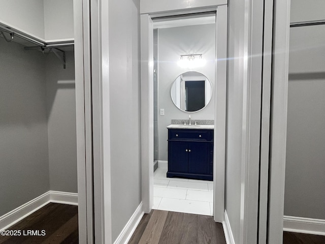 9 Attaway Ln, Beaufort, SC 29907 - bathroom featuring vanity, wood finished floors, and baseboards