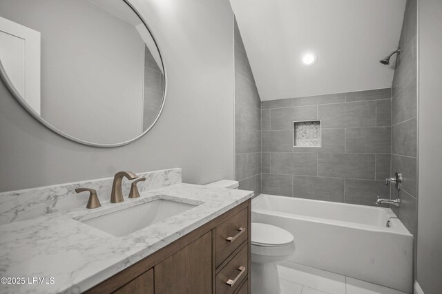 9 Attaway Ln, Beaufort, SC 29907 - full bath with toilet, vanity, shower / tub combination, tile patterned flooring, and vaulted ceiling