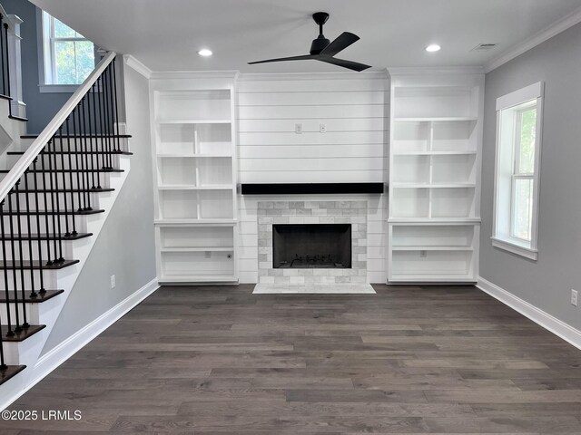 9 Attaway Ln, Beaufort, SC 29907 - unfurnished living room featuring a ceiling fan, stairs, crown molding, baseboards, and dark wood-style floors