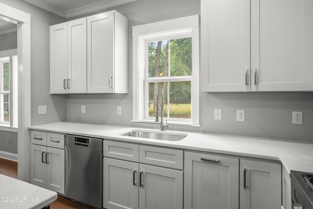 9 Attaway Ln, Beaufort, SC 29907 - kitchen with dishwasher, a sink, crown molding, light countertops, and dark wood finished floors