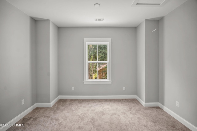 9 Attaway Ln, Beaufort, SC 29907 - carpeted spare room featuring attic access and baseboards