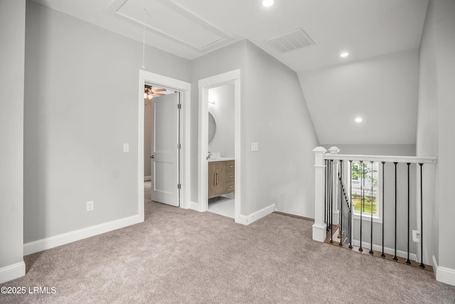9 Attaway Ln, Beaufort, SC 29907 - unfurnished bedroom with attic access, carpet flooring, recessed lighting, baseboards, and lofted ceiling