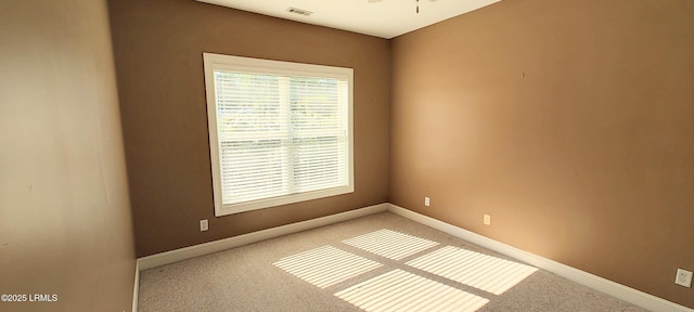 25 Kings Cross Ct, Beaufort, SC 29902 - spare room with carpet, baseboards, and a ceiling fan