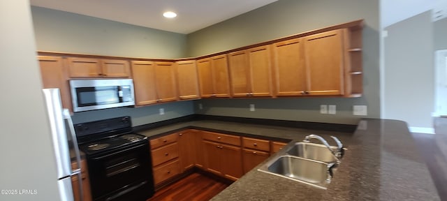 25 Kings Cross Ct, Beaufort, SC 29902 - kitchen featuring stainless steel microwave, black / electric stove, a sink, open shelves, and a peninsula