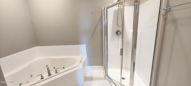 25 Kings Cross Ct, Beaufort, SC 29902 - bathroom with a stall shower, a jetted tub, and tile patterned floors