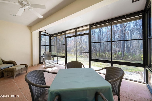 sunroom with a ceiling fan and a healthy amount of sunlight