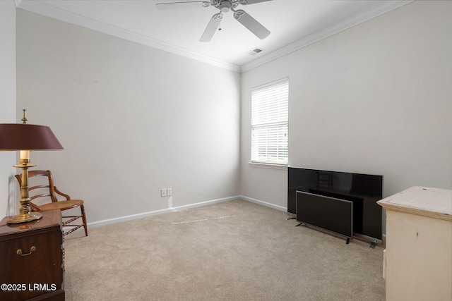 misc room with visible vents, crown molding, ceiling fan, baseboards, and carpet