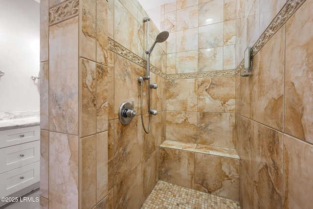 full bath featuring a tile shower