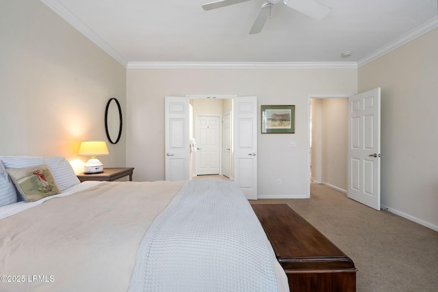 carpeted bedroom with baseboards, ceiling fan, and crown molding