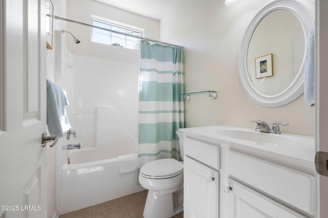 bathroom featuring toilet, shower / bath combination with curtain, vanity, and tile patterned flooring