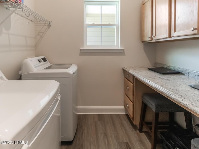 1872 Hearthstone Lake Dr, Ridgeland, SC 29936 - laundry room with cabinet space, washer and clothes dryer, dark wood-style floors, and baseboards