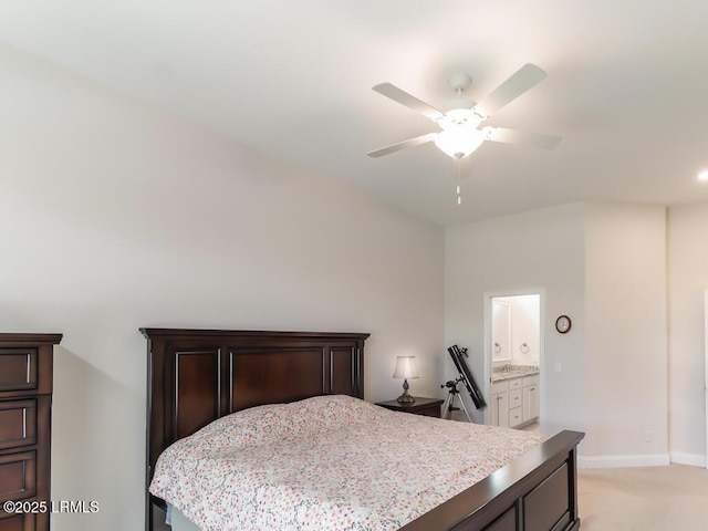 1872 Hearthstone Lake Dr, Ridgeland, SC 29936 - bedroom with baseboards, ceiling fan, ensuite bathroom, and light colored carpet