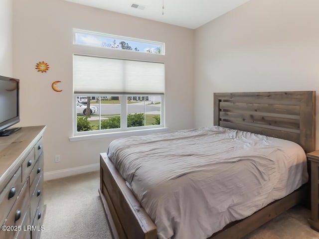 1872 Hearthstone Lake Dr, Ridgeland, SC 29936 - bedroom with light carpet and baseboards