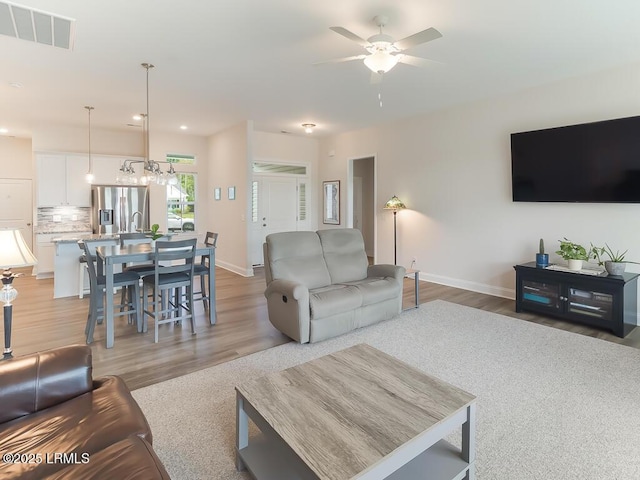 1872 Hearthstone Lake Dr, Ridgeland, SC 29936 - living room with ceiling fan, wood finished floors, baseboards, and recessed lighting