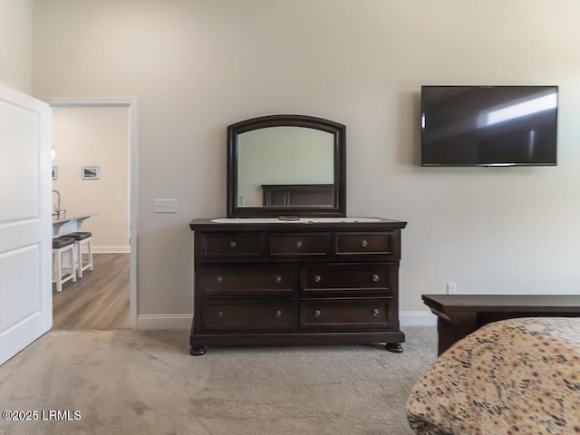 1872 Hearthstone Lake Dr, Ridgeland, SC 29936 - bedroom featuring baseboards and light carpet
