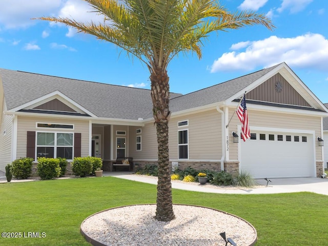 1872 Hearthstone Lake Dr, Ridgeland, SC 29936 - view of front of property with stone siding, a garage, and a front yard