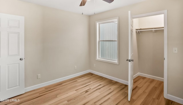 416 Meritta Ave, Beaufort, SC 29902 - unfurnished bedroom featuring wood finished floors, ceiling fan, a closet, and baseboards