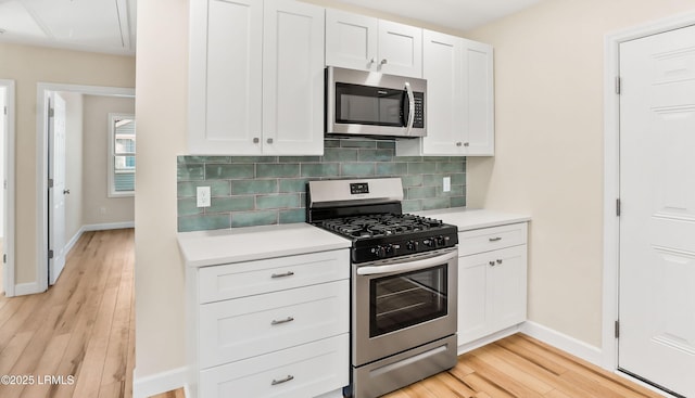 416 Meritta Ave, Beaufort, SC 29902 - kitchen featuring light wood-style flooring, light countertops, and appliances with stainless steel finishes