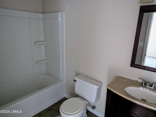 full bathroom featuring vanity, tile patterned floors, toilet, and bathtub / shower combination