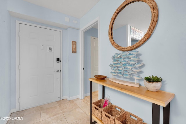 view of tiled foyer entrance