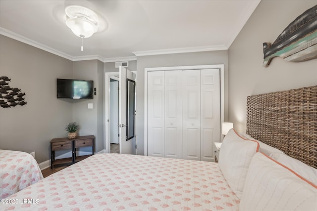 21 S Forest Beach Dr Unit 210, Hilton Head Island, SC 29928 - bedroom featuring a closet and crown molding