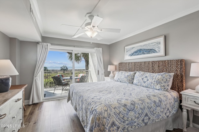 21 S Forest Beach Dr Unit 210, Hilton Head Island, SC 29928 - bedroom featuring access to exterior, light wood finished floors, ornamental molding, and a ceiling fan