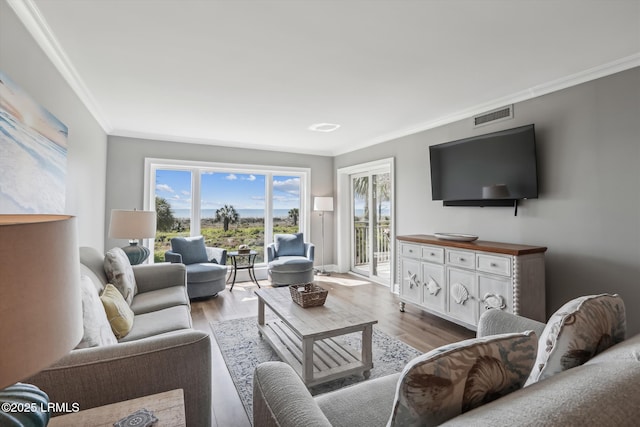 21 S Forest Beach Dr Unit 210, Hilton Head Island, SC 29928 - living room with ornamental molding and wood finished floors