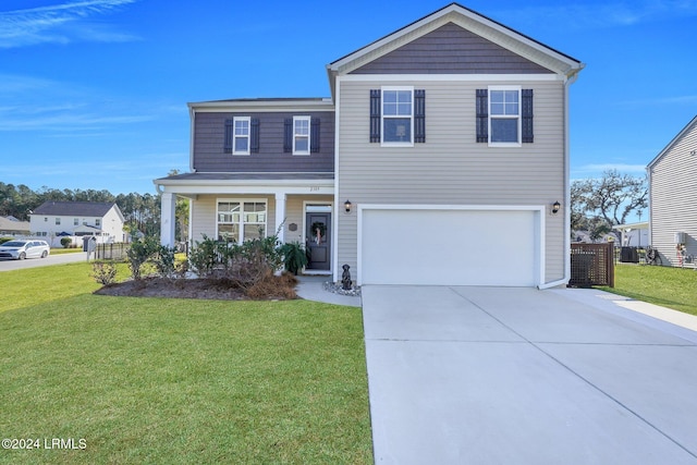 view of property with a garage, a porch, and a front yard