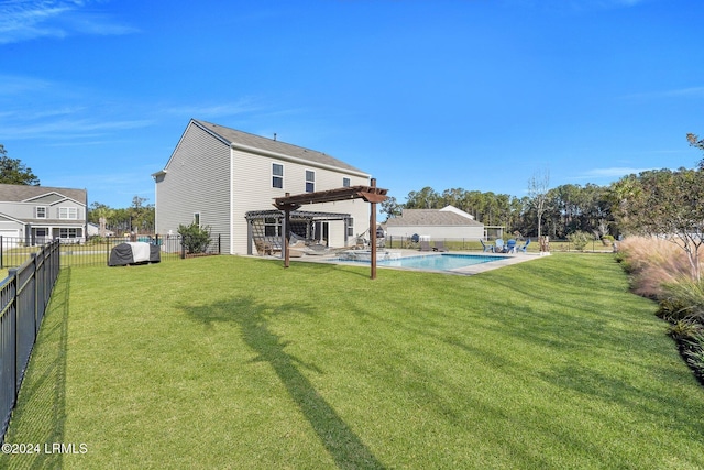 back of property featuring a fenced in pool, a yard, and a pergola