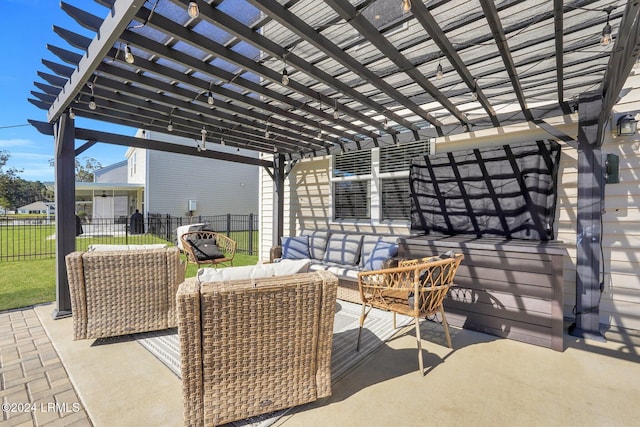 view of patio / terrace featuring a pergola and an outdoor hangout area