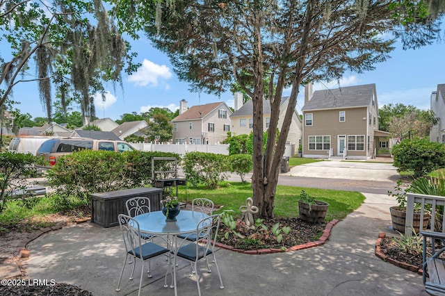 4 Savile Ave, Bluffton, SC 29910 - view of patio featuring a residential view and outdoor dining space