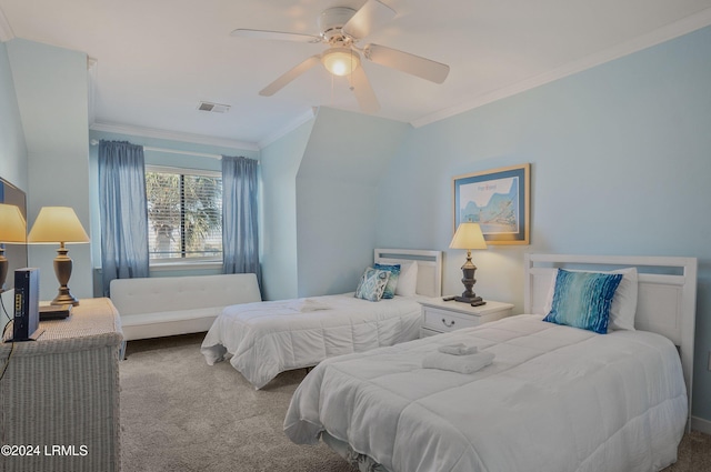 carpeted bedroom featuring crown molding and ceiling fan