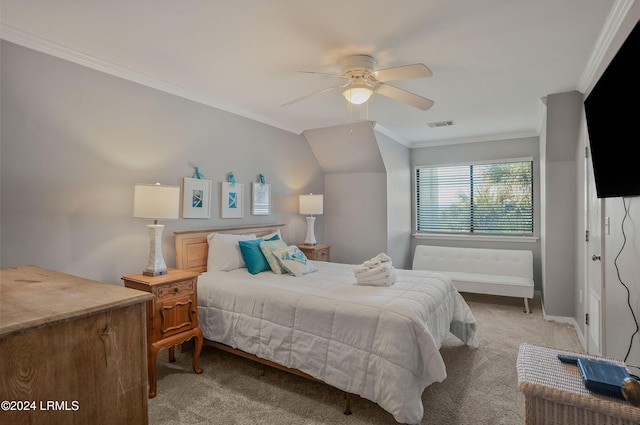 bedroom featuring light colored carpet, ornamental molding, and ceiling fan